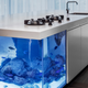Illustration for article titled There's a Miniature Ocean Trapped Inside This Kitchen Island